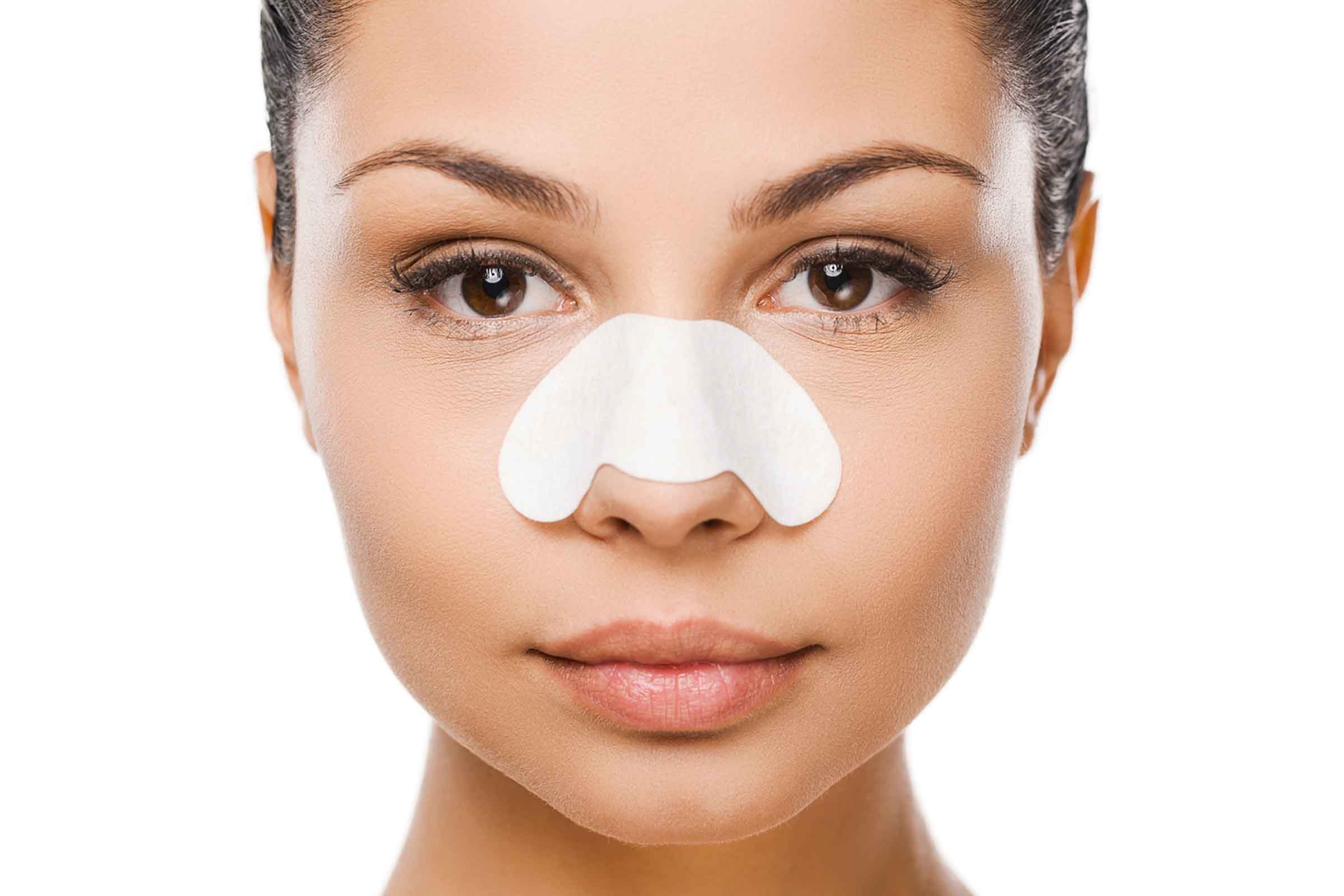 woman with nasal strip on nose