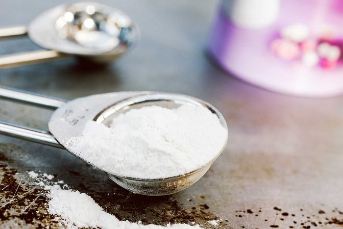 measuring spoon full of baking soda