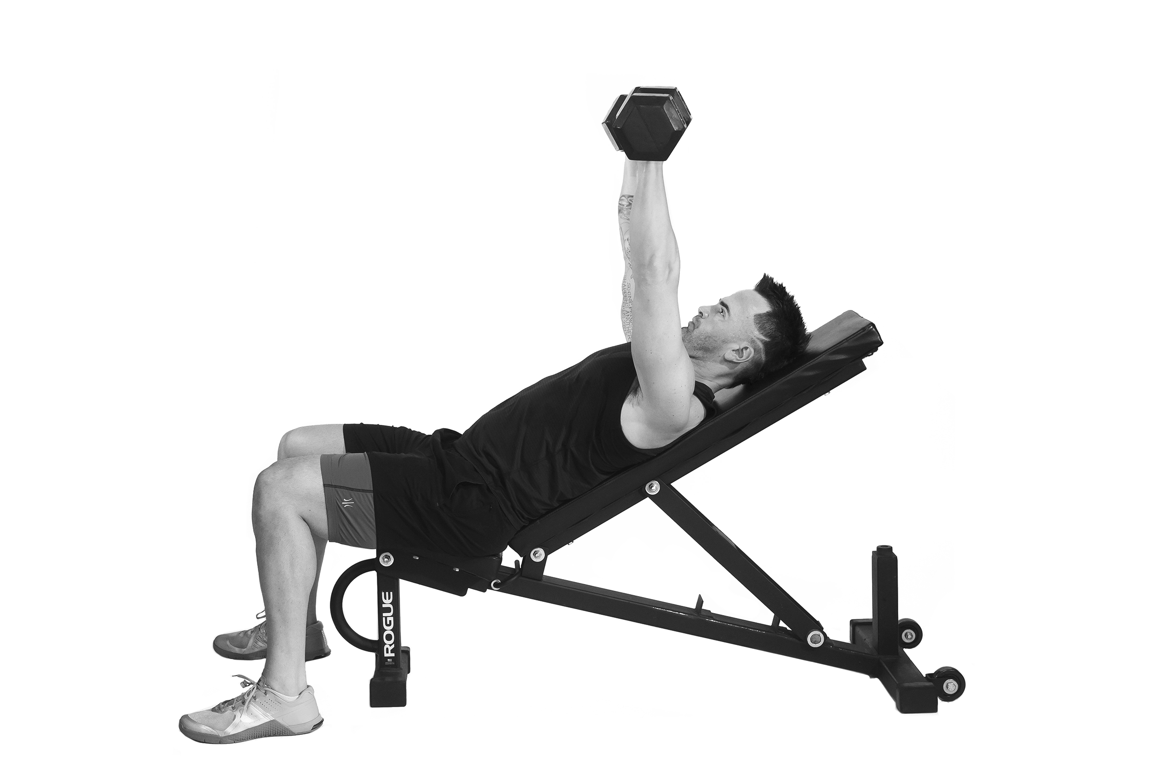 Man doing incline dumbbell chest presses