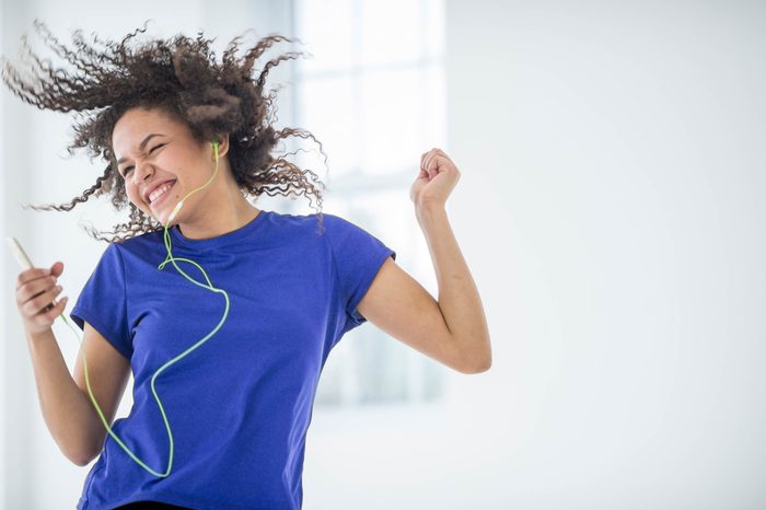 Woman with ipod dancing.