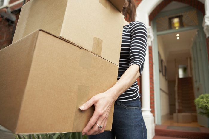 woman holding boxes
