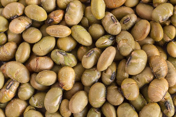 Closeup of roasted edamame.