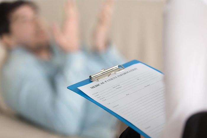 therapist patient and clipboard