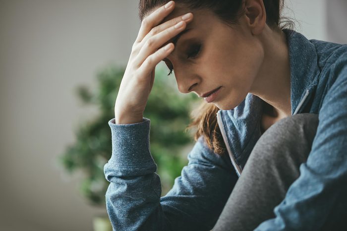 woman looking distraught