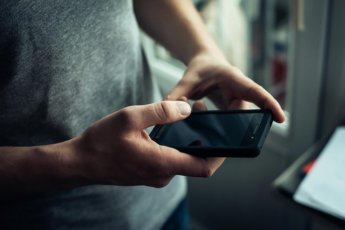 man checking his cellphone
