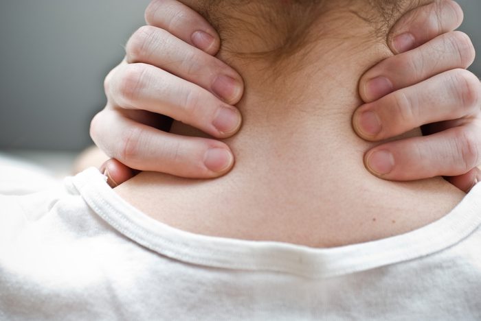 Woman has neck pain