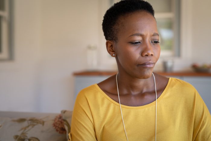 mature woman concerned thinking