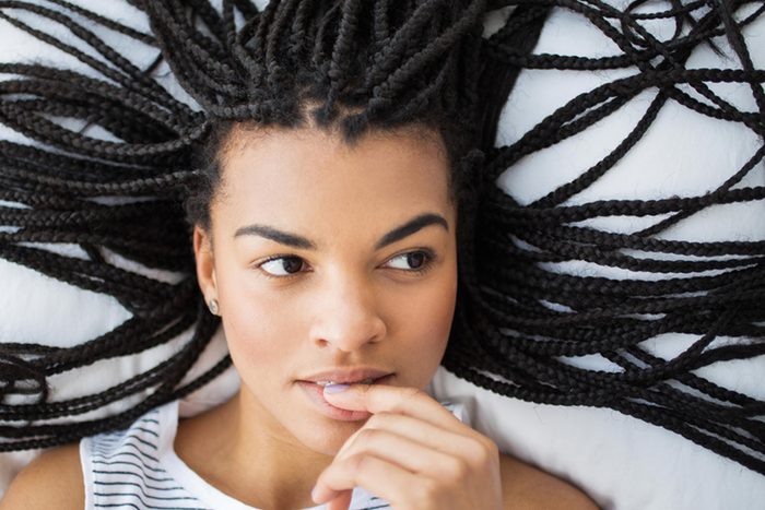 woman lying down with hair spread out