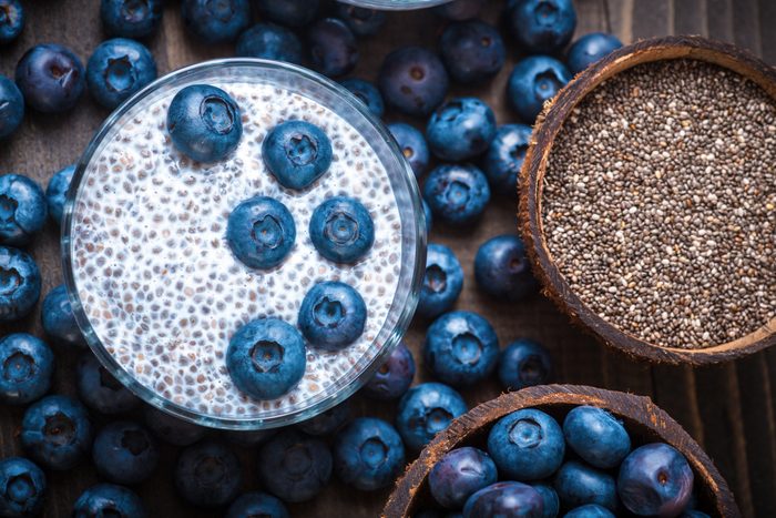 Chia Pudding, blackberry in coconut shell